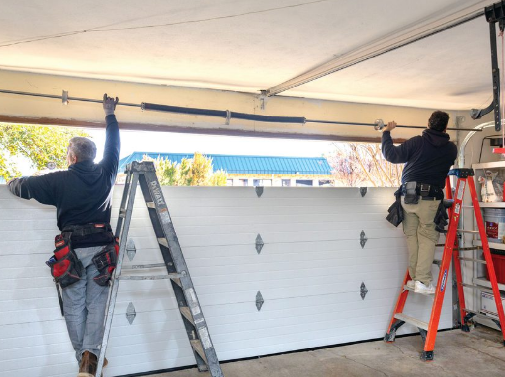 Close-up image of a technician repairing a garage door opener in Cape Coral, FL, showcasing professional garage door repair services.
